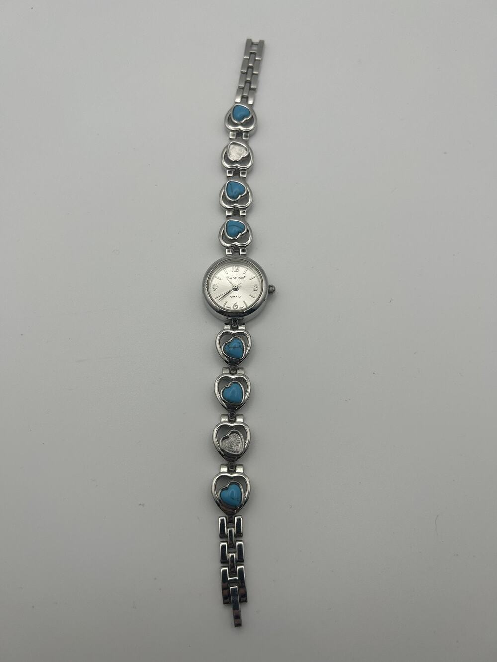 Bay Studio Womens Watch Blue Crystal Heart Bracelet Silver Sunburst Dial Runs